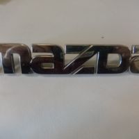 Эмблема на крышку багажника (логотип MAZDA) B25R51710