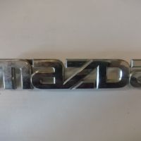 Эмблема на крышку багажника (логотип MAZDA) GS1D51710