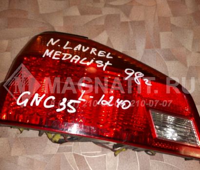 Фонарь задний ЛЕВЫЙ L1240 Nissan Laurel MEDALIST (GNC35)